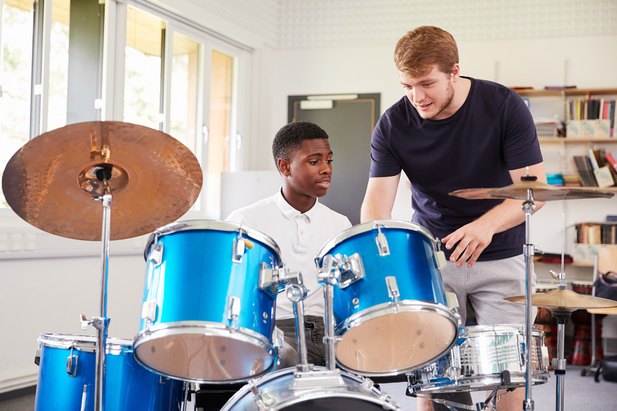 The Beat of Unity: Exploring the Power of Group Drum Lessons